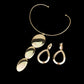 Bold Golden Pendant Necklace and Long Drop Earrings