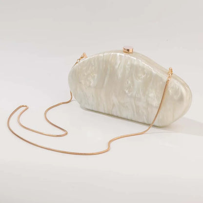 Organic-Shape Pearlescent Hard Shell Dinner Bag with Clasp Closure