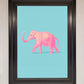 Pink Elephant on Blue Framed Print