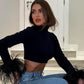 TAOViK Classic Black Turtleneck Women's Top Frilly Cuffs